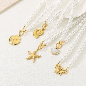 French vintage pearl chain bracelets with gold shell, starfish and heart charms