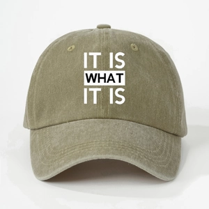 Classic washed cotton baseball cap in olive green with IT IS WHAT IT IS printed text