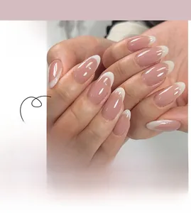Close-up of minimalist white French tip press-on nails with oval shape and nude base