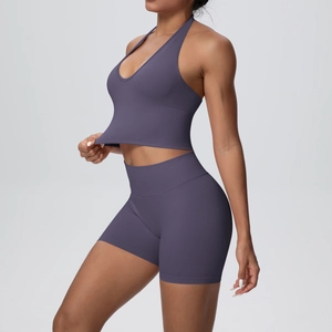 Seamless ribbed yoga set with halter neck sports bra and high-waist fitness shorts