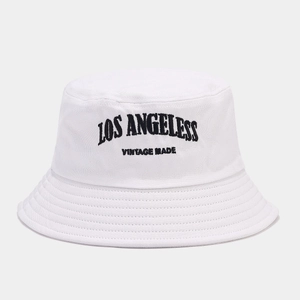 Detail of white cotton bucket hat with black vintage Los Angeles embroidery and stitching