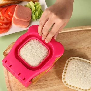 Pink stainless steel sandwich cutter and sealer tool for DIY square pocket bread making