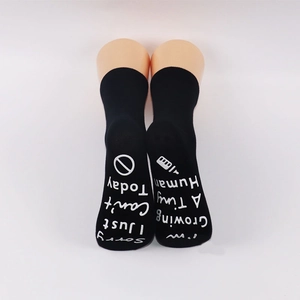 Detailed view of non-slip socks with funny pregnancy text Sorry I Just Can't Today