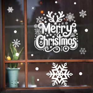 Detailed white Merry Christmas window decals with snowflakes on glass pane