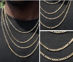 Detail of 3mm gold Figaro chain necklaces in layered arrangement on black knit