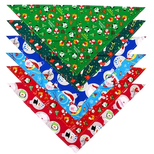 Christmas dog bandana set featuring festive cotton prints of Santa and snowmen