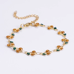 3D 18K gold plated cherry bracelet with orange resin fill and green enamel leaves