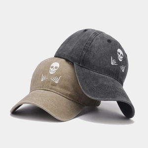 Classic cotton baseball cap with skull hand gesture print in khaki and charcoal gray