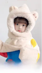 Detail of plush beige 3-in-1 children hood scarf and gloves with cute animal ears