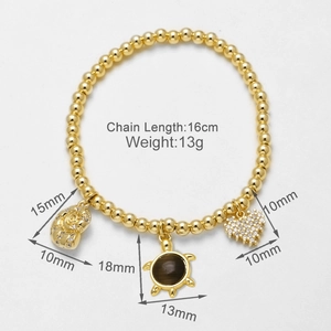 Detailansicht Goldperlenarmband mit Zirkon-Herz und Schildkröten-Anhänger charms