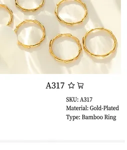 Detail of 18K gold plated bamboo joint rings showing multiple pieces with soft natural light