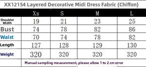 Tabla de tallas detallada para el vestido midi de gasa a capas con medidas de cintura