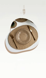 Detail of natural jute placemat set with oval mat and round coaster for dining aesthetics