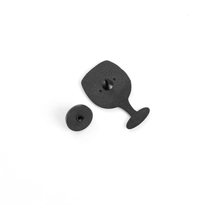 Black wine glass enamel pin back view with rubber clutch on a white background
