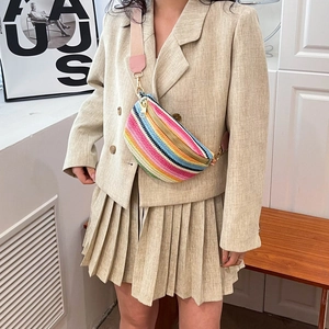 Bohemian woven waist bag with colorful stripes and pink wide strap for summer beach