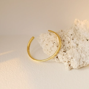 Irregular lunar surface texture gold plated titanium steel open bangle for women