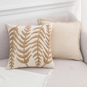 Modern Nordic beige throw pillows with leaf embroidery and textured fabric for sofa
