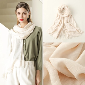 Beige cotton linen scarf for women featuring fringe edges and various product display angles