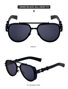 Detail view of matte black pilot sunglasses with grey lenses and double bridge design