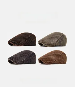 Vertical rib knit newsboy hats in four retro washed colors with soft top structure