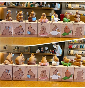 Detailed set of 7 decorative resin capybara figurines in various cute poses and scenes
