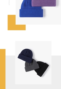 Close-up of ribbed knit texture on thick winter beanies in blue, purple, and navy shades