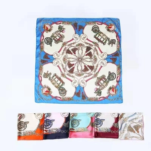 Detail showing various colors of 90x90cm satin scarf with carriage and tassel patterns