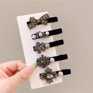 Set of five elegant black velvet hair clips with grey rhinestones and pearls