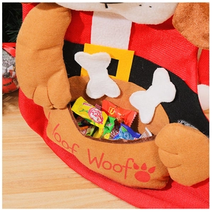 Detail of cute dog-themed Christmas stocking filled with sweets on wooden background