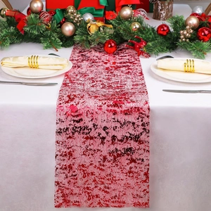 Red festive table runner with gold foil mesh pattern for elegant Christmas party decor
