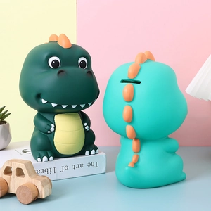 Cartoon dinosaur piggy bank for kids in green and teal colors, creative resin coin bank