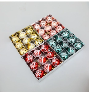Detailed set of 36 Christmas ornaments in four colors with white holiday patterns