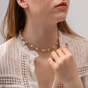 Chic 18k gold stainless steel necklace featuring colorful beads and natural pearls