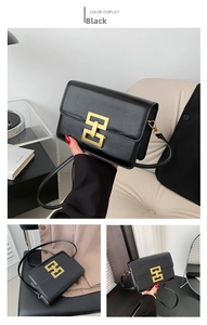 Close-up of black leather crossbody bag featuring a golden geometric H-link metal buckle