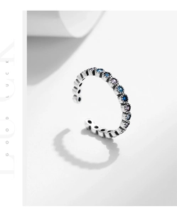 Macro view of vintage 925 sterling silver ring with colorful gradient cubic zirconia stones