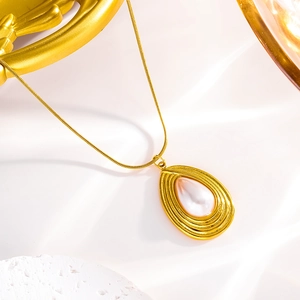 French vintage teardrop pearl necklace with gold plated texture and sleek snake chain
