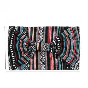Detail view of Bohemian stripe yoga headband with dimensions 23cm by 14cm and 27g weight