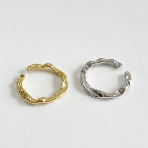 Irregular wave 925 silver open rings shown in gold and silver finishes on white backdrop