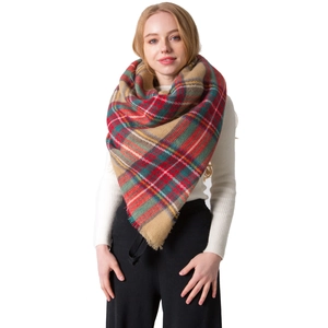 Oversized colorful plaid cashmere scarf with tassels styled as a shawl on a female model