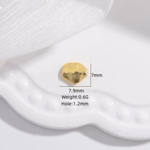 Irregular multifaceted S925 sterling silver bead in golden finish with 1.2mm hole size