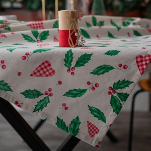Christmas tablecloth with heart and holly leaf print on a premium cotton linen fabric