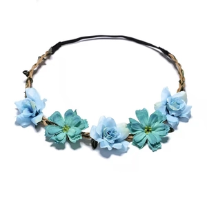 Close-up of blue floral bridal headband with woven rope and elastic band for weddings