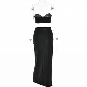 Detail view of black strapless crop top and high waist split maxi skirt set on mannequin
