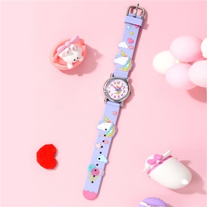 Macro shot of purple silicone watch strap with 3D unicorn star and cloud patterns