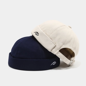 Unisex cotton canvas miki hats in navy and beige featuring letter D embroidery