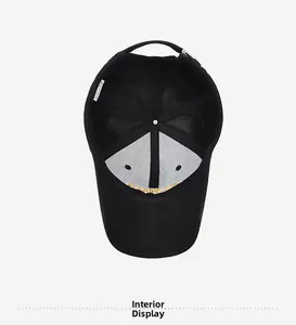 Detailed interior view of a black baseball cap with reinforced seams and adjustable metal buckle