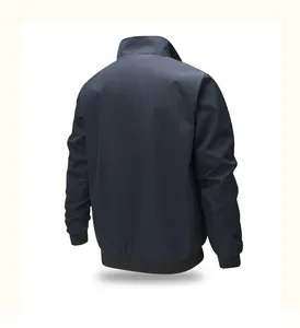 Detail view of navy blue pilot jacket featuring ribbed collar and windproof fabric