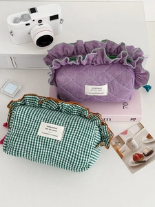 Quilted cotton checkered storage bags with ruffle edges in purple and dark green