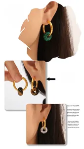 Detail of tiger eye and malachite charms on gold titanium steel hoop earrings set