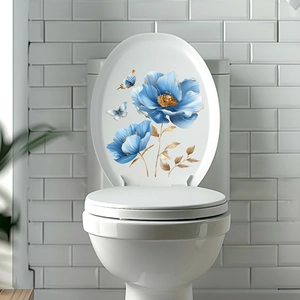 Dettaglio dell'adesivo impermeabile per coperchio WC con fiori blu e farfalle